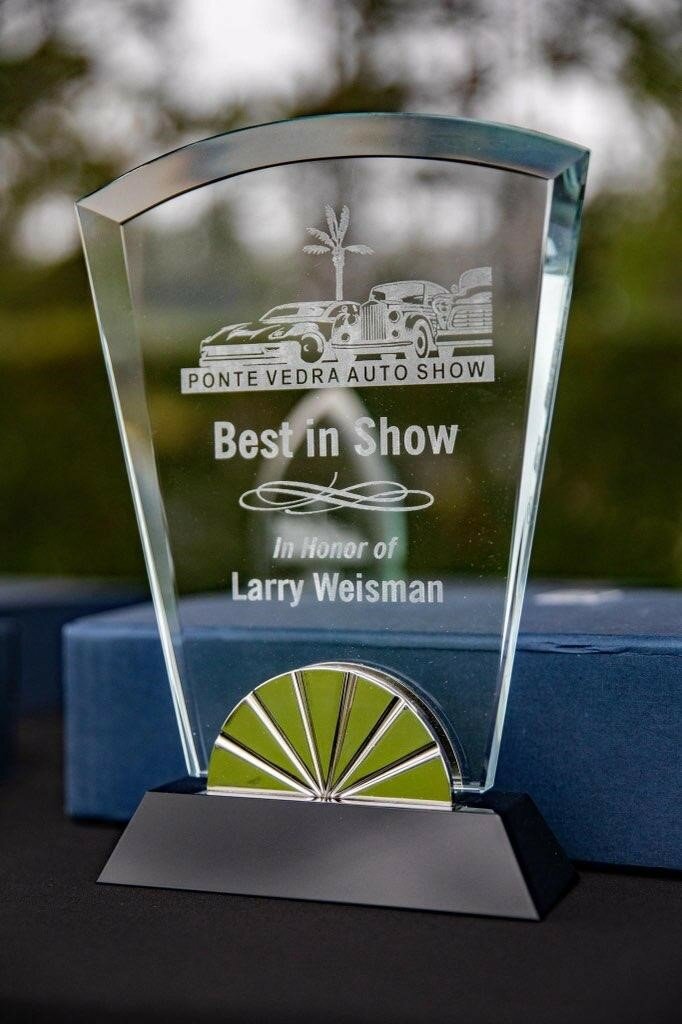 Following his passing in 2019, the Ponte Vedra Auto Show honored Larry Weisman by naming the overall “best in show” trophy after him.